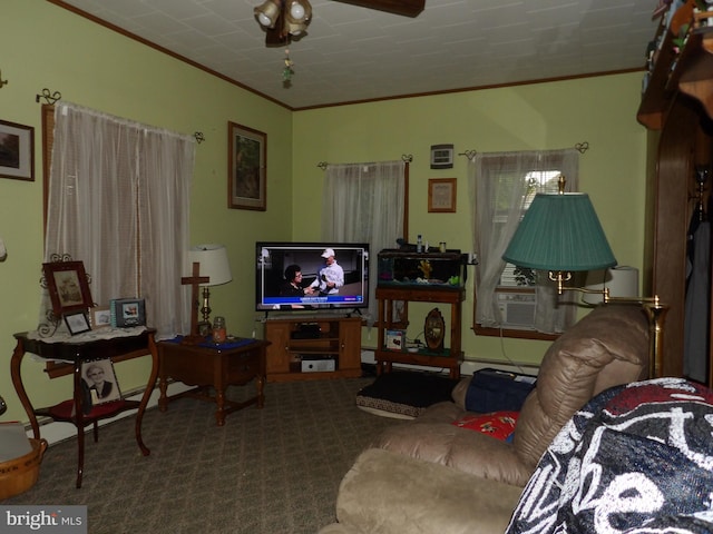 carpeted living room featuring ceiling fan and crown molding