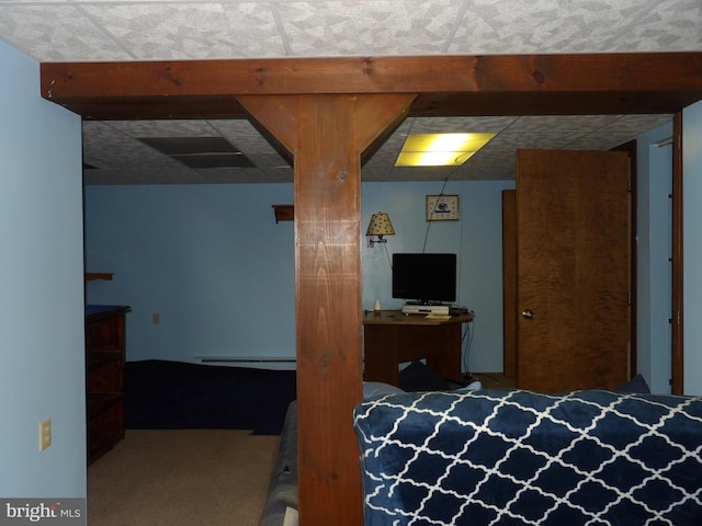 carpeted bedroom featuring a baseboard radiator