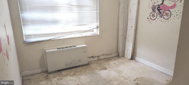 interior space featuring a wealth of natural light and baseboards