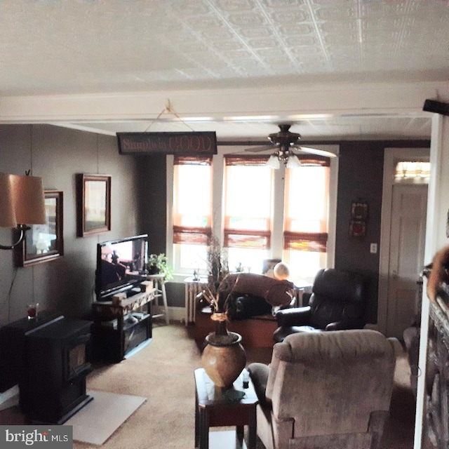 living room with carpet and ceiling fan