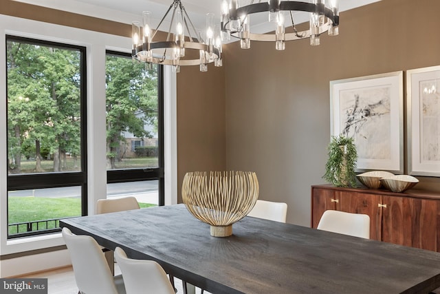 dining area featuring a chandelier