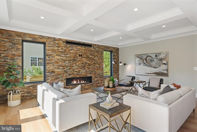 living room featuring beam ceiling, coffered ceiling, and hardwood / wood-style floors