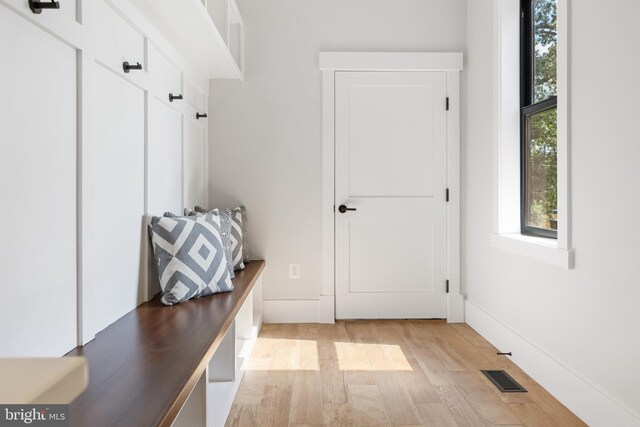 mudroom with light wood-type flooring