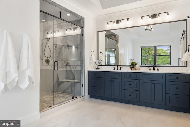 bathroom with walk in shower, ornamental molding, and vanity