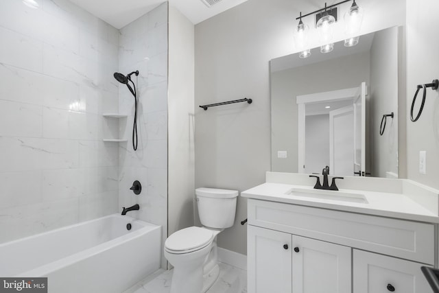 full bathroom featuring tiled shower / bath combo, vanity, and toilet