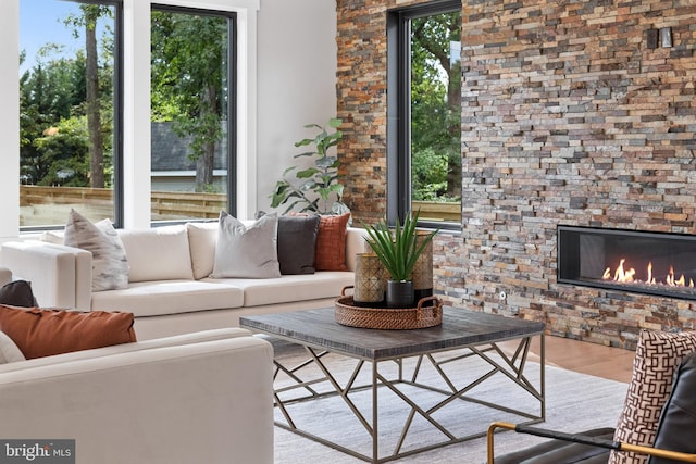 interior space featuring a glass covered fireplace