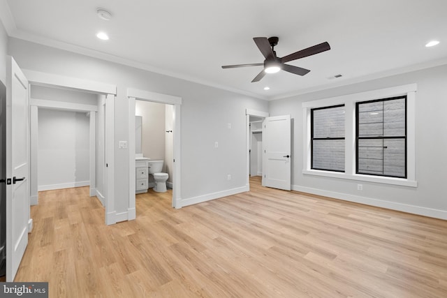 unfurnished bedroom featuring ceiling fan, light wood-type flooring, connected bathroom, and ornamental molding