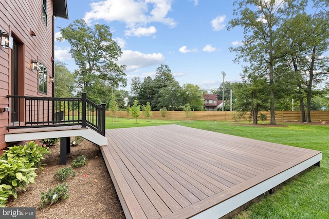 deck featuring a yard