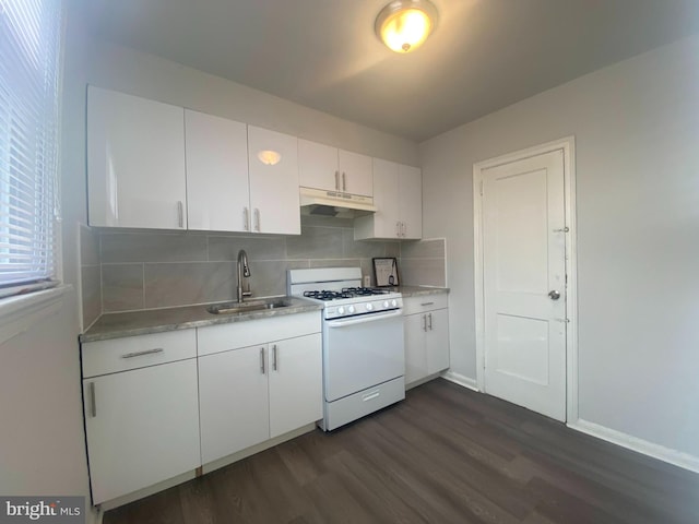 kitchen featuring white cabinetry, tasteful backsplash, gas range gas stove, sink, and dark hardwood / wood-style floors