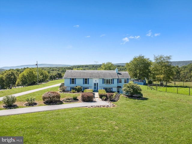 view of front of house with a front lawn