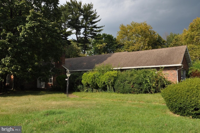 exterior space with a front lawn