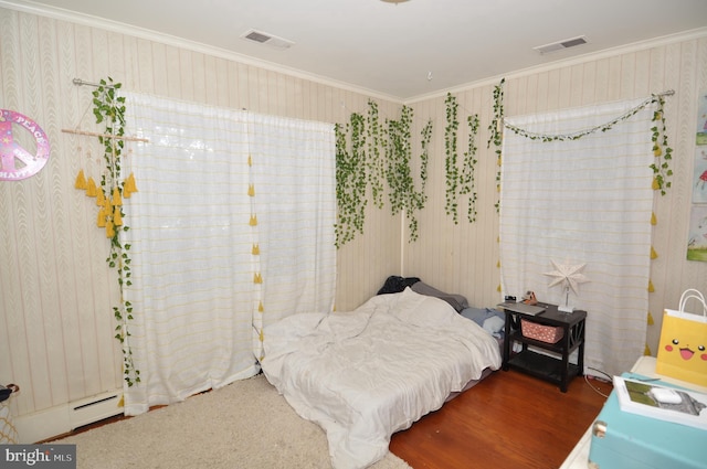 bedroom with ornamental molding