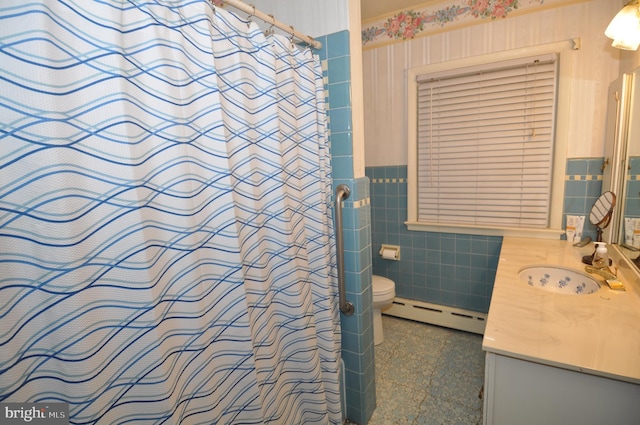 bathroom with toilet, vanity, a baseboard radiator, tile walls, and a shower with shower curtain