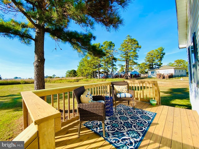 deck featuring a lawn