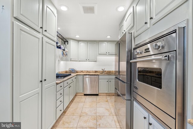 kitchen with appliances with stainless steel finishes and sink