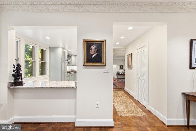 hall with parquet flooring