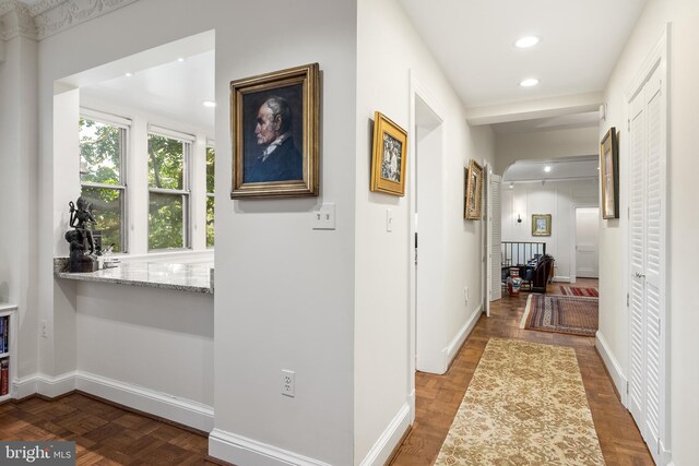 hallway with parquet floors