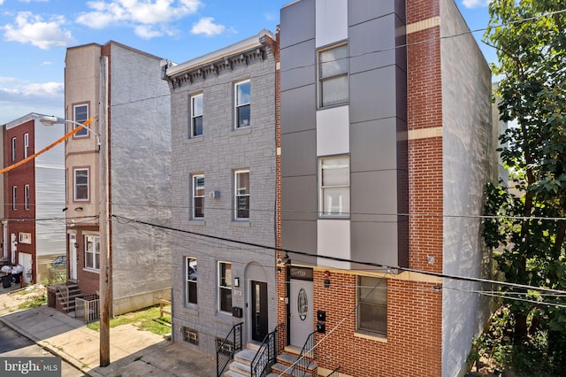 view of building exterior featuring entry steps