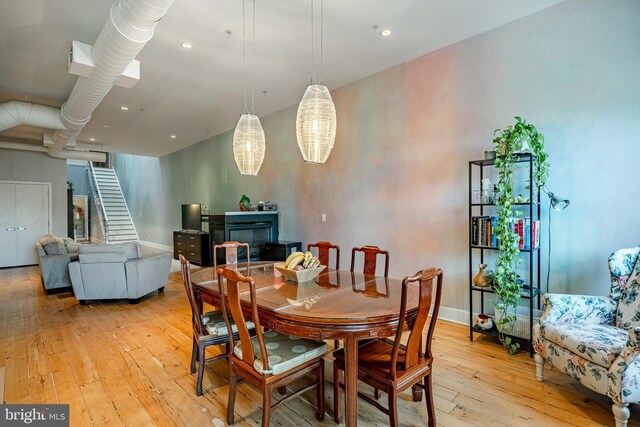 dining area with light hardwood / wood-style floors