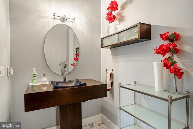 bathroom with sink and tile patterned floors