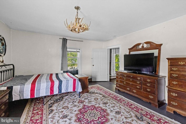 bedroom featuring dark hardwood / wood-style floors