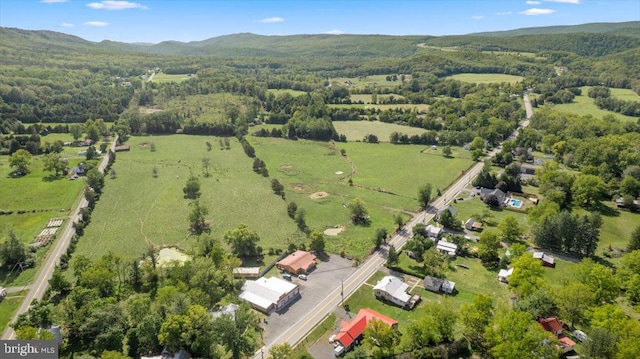 aerial view featuring a mountain view and a rural view