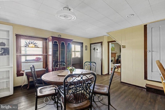 dining room with dark hardwood / wood-style floors