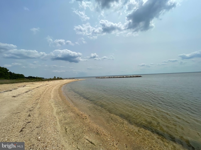 property view of water featuring a view of the beach