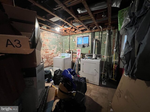 basement with separate washer and dryer