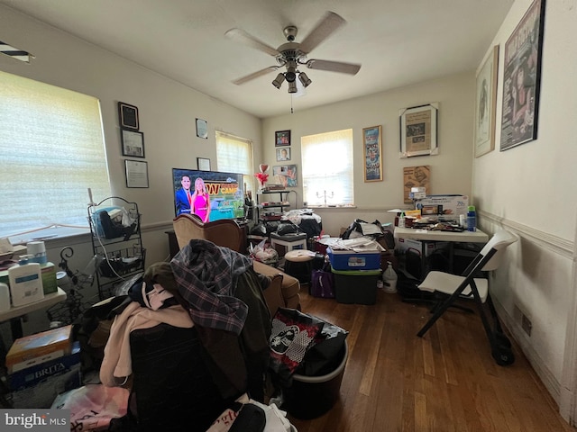 home office with hardwood / wood-style floors and ceiling fan