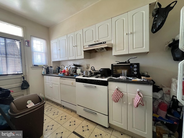 kitchen featuring white cabinetry, white appliances, and sink