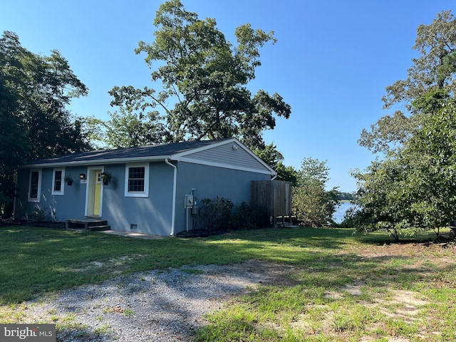 exterior space with a front yard