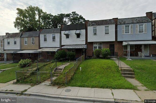 view of property with a front lawn