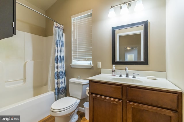 full bathroom with vanity, toilet, hardwood / wood-style floors, and shower / bathtub combination with curtain