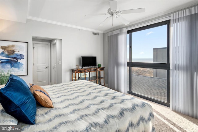 bedroom featuring crown molding, ceiling fan, and carpet