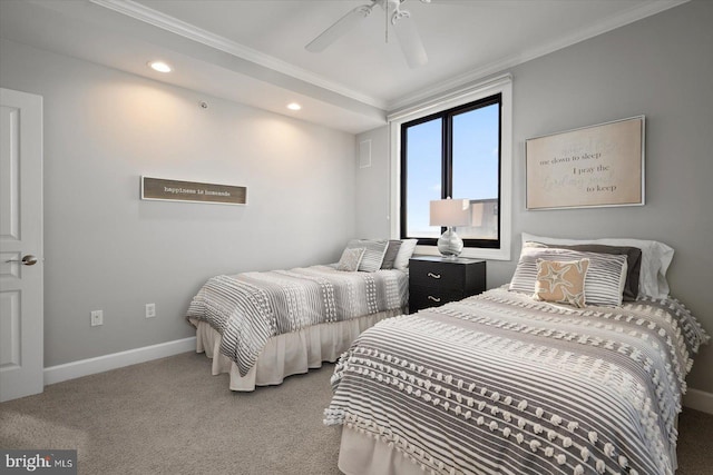 carpeted bedroom with crown molding and ceiling fan