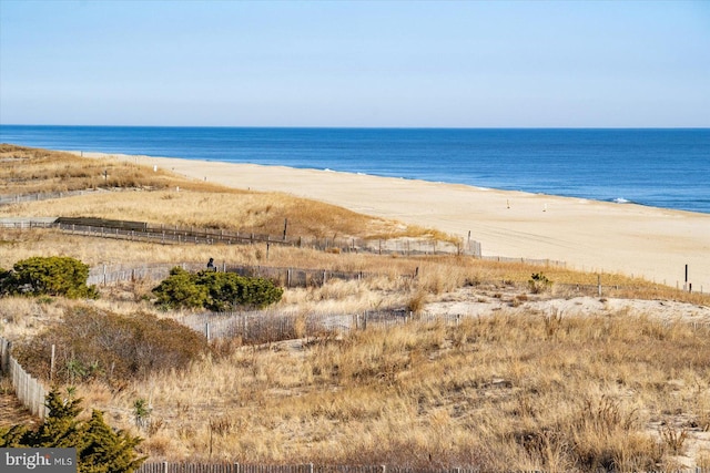 view of water feature with a beach view