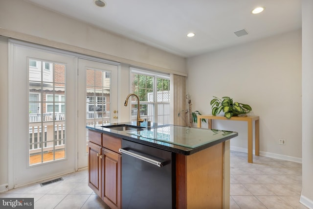 kitchen featuring a center island with sink, recessed lighting, visible vents, stainless steel dishwasher, and a sink