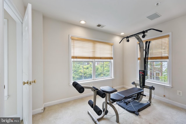 workout room featuring carpet floors, recessed lighting, visible vents, and baseboards