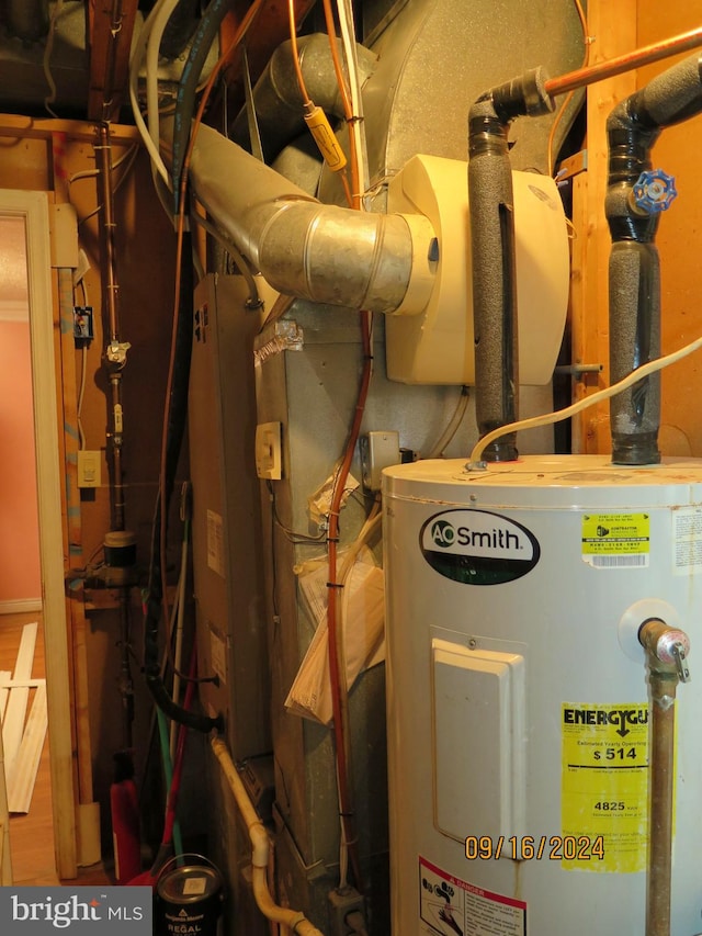 utility room with water heater