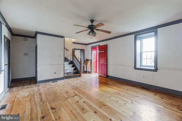 unfurnished room featuring wood-type flooring, ceiling fan, and crown molding