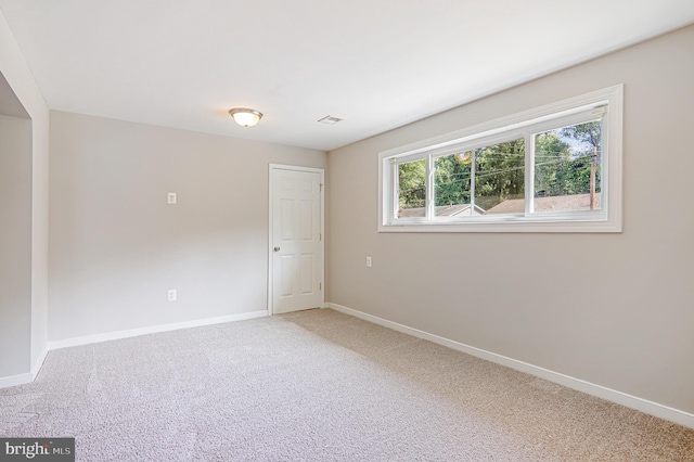 view of carpeted spare room