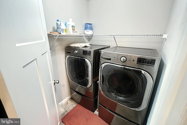 laundry room featuring independent washer and dryer