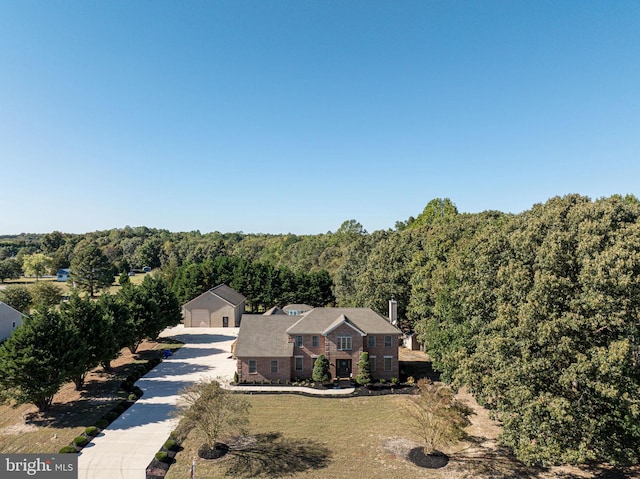 bird's eye view featuring a forest view