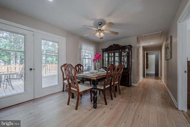 dining area featuring french doors, light hardwood / wood-style floors, and ceiling fan