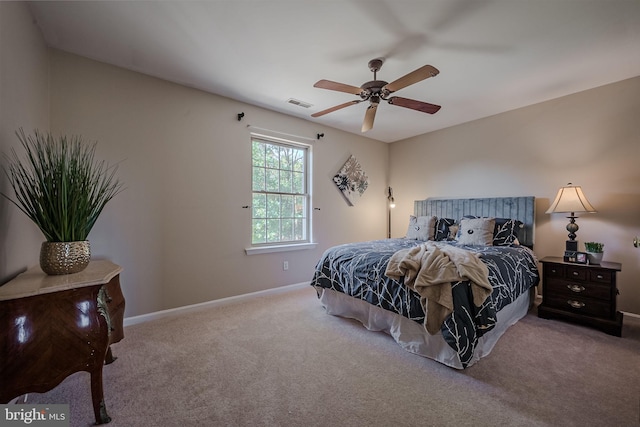 bedroom featuring ceiling fan and carpet floors