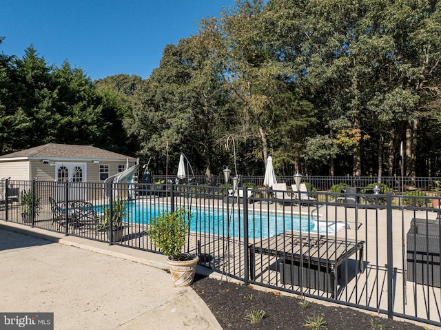 view of pool with a patio area