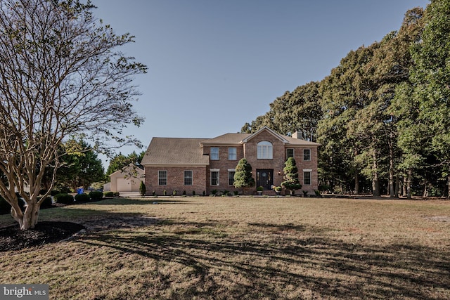 view of front of home with a front lawn