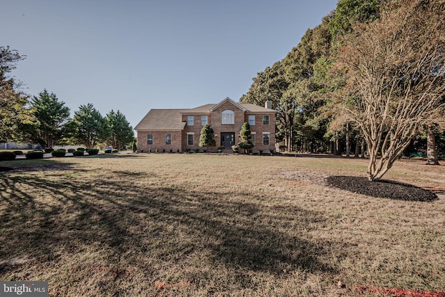 view of front of house with a front lawn