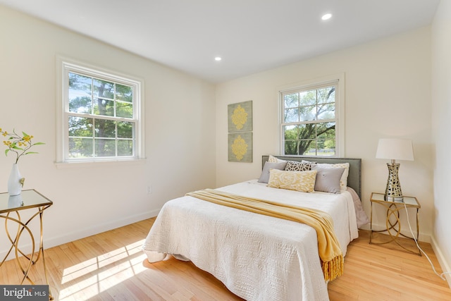 bedroom with light wood-type flooring